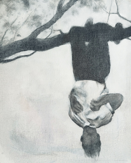 man hangs from a tree
